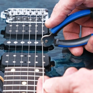MUSIC NOMAD • Grip One - All in ONE String Winder, Cutter, Puller • Мултитул за струни