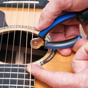 MUSIC NOMAD • Grip One - All in ONE String Winder, Cutter, Puller • Мултитул за струни