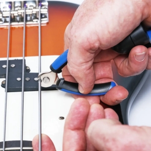 MUSIC NOMAD • Grip One - All in ONE String Winder, Cutter, Puller • Мултитул за струни